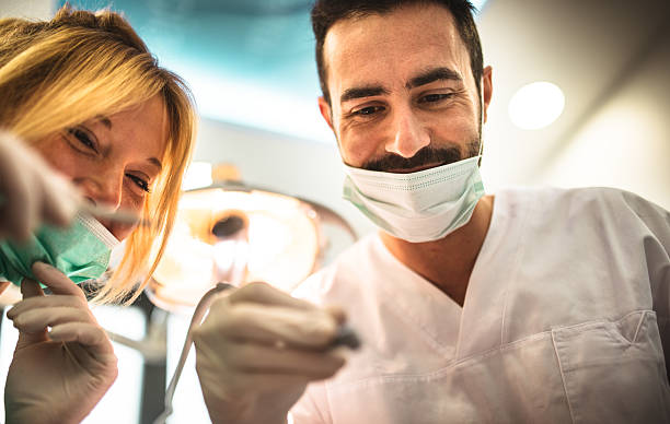 dental professionals happily doing their job